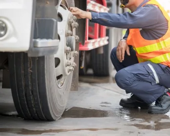 I-40 Mobile Repair technician servicing a commercial truck wheel roadside